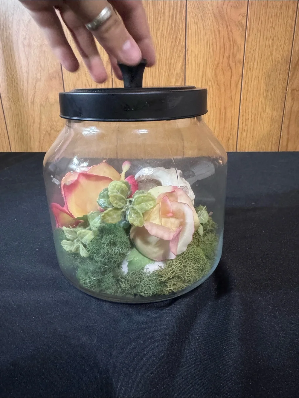 Black Lid Glass Terrarium Jar with Floral and Moss Display